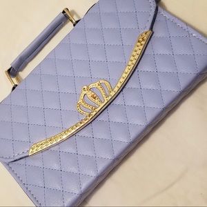 Periwinkle blue quilted leather handbag